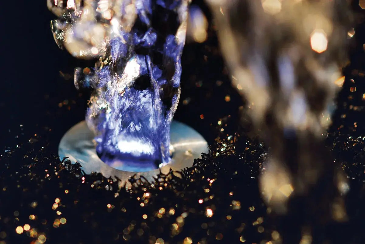 OASE Quellbeleuchtung – stimmungsvolles Licht für Brunnen & Wasserspiele - Japankoi.net