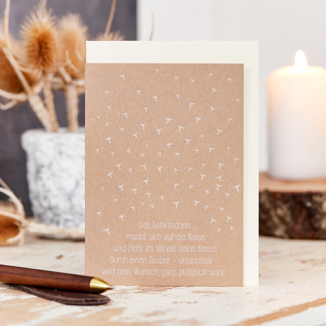 Grußkarte "Schirmchen auf der Reise"